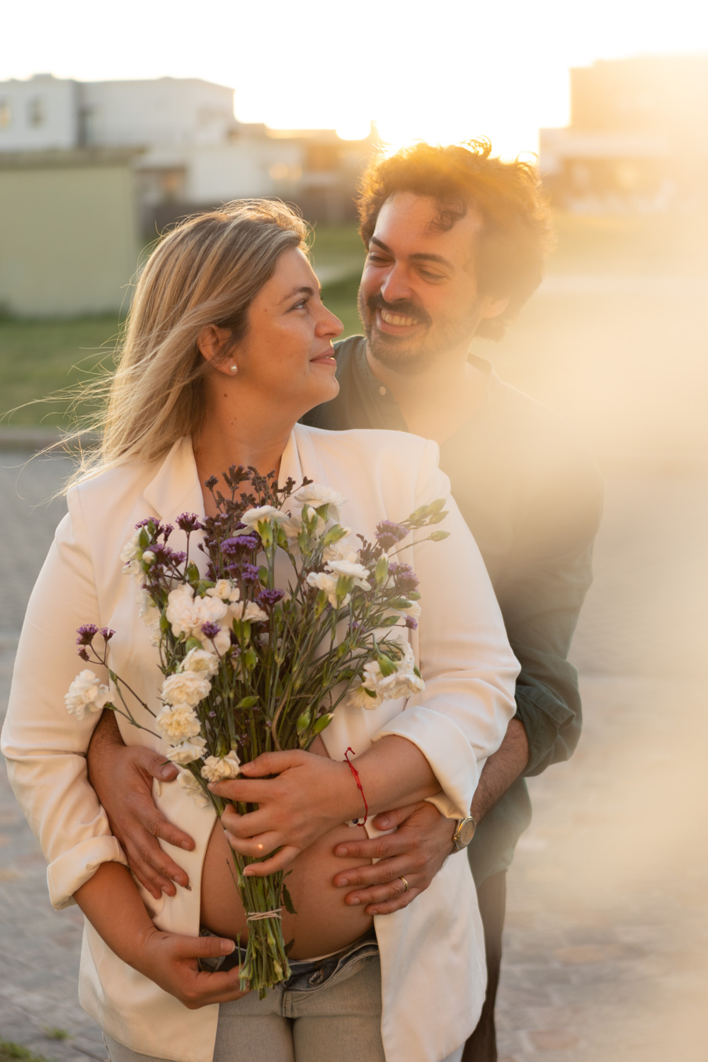 sesion de fotos de familia al atardecer en buenos aires, argentina al atardecer retratos padres