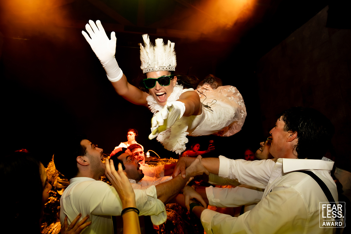 fearless award best wedding photographers in the world bride in the aire