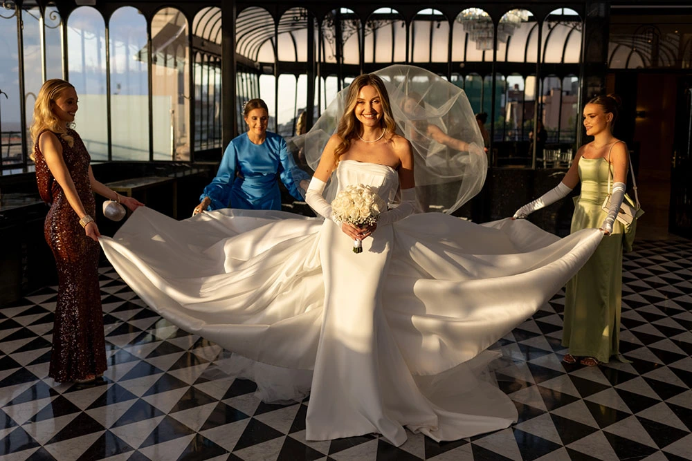 Bride smiling with her bridesmaids during an International & Destination Wedding celebration in Argentina.